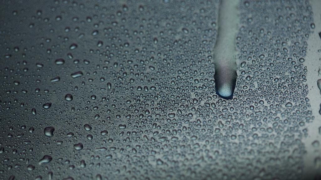 Water condensation dripping down truck door