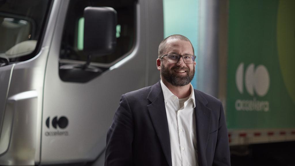 Accelera engineer standing in front of our zero-emission truck