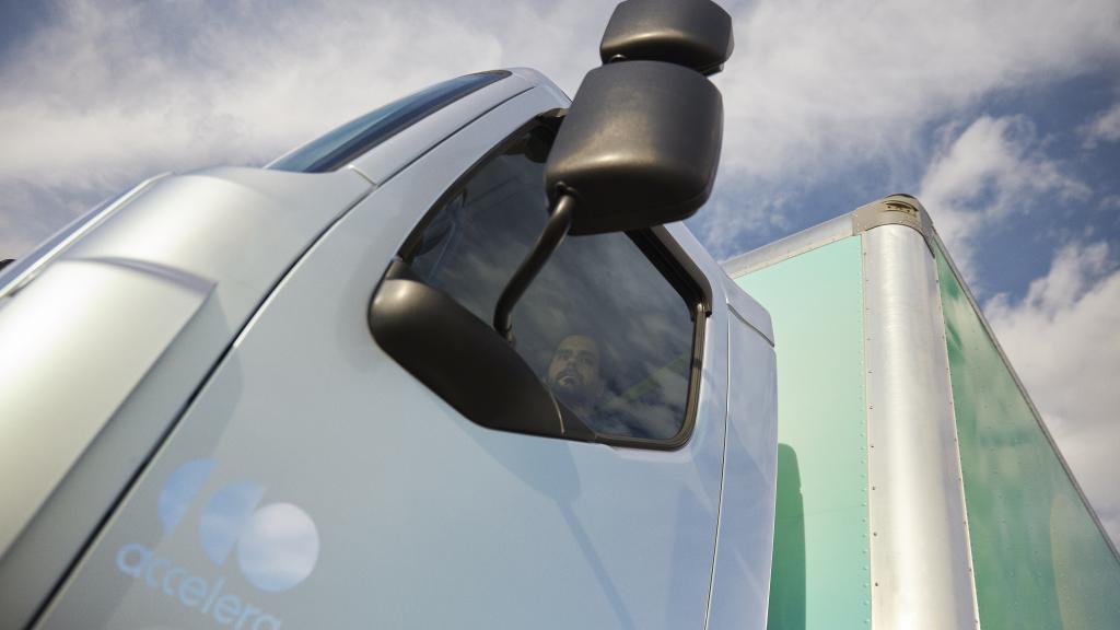 An upward shot of the side door on an Accelera electric truck