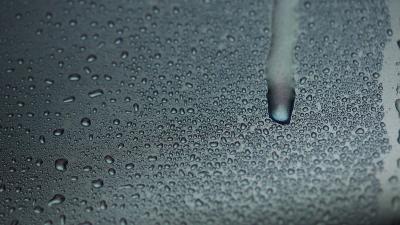 Water condensation dripping down truck door