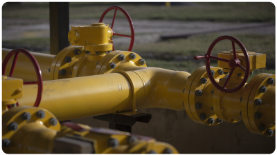 Large yellow gas pipes with red shut off valves