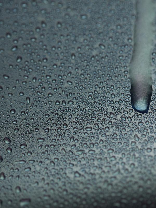 Water condensation dripping down truck door