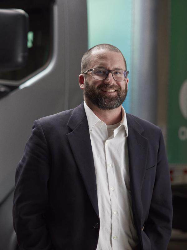 Accelera engineer standing in front of our zero-emission truck