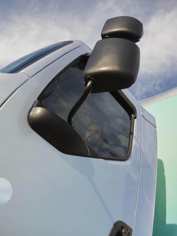 An upward shot of the side door on an Accelera electric truck
