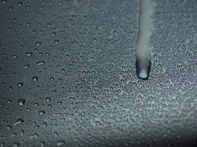 Water condensation dripping down truck door