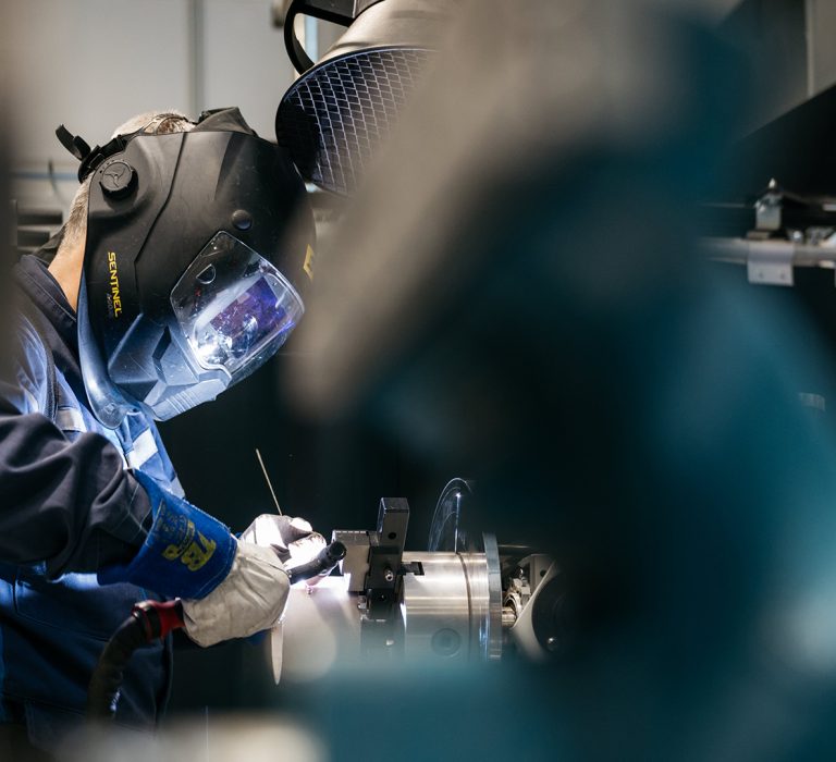 Man wearing a welding mask