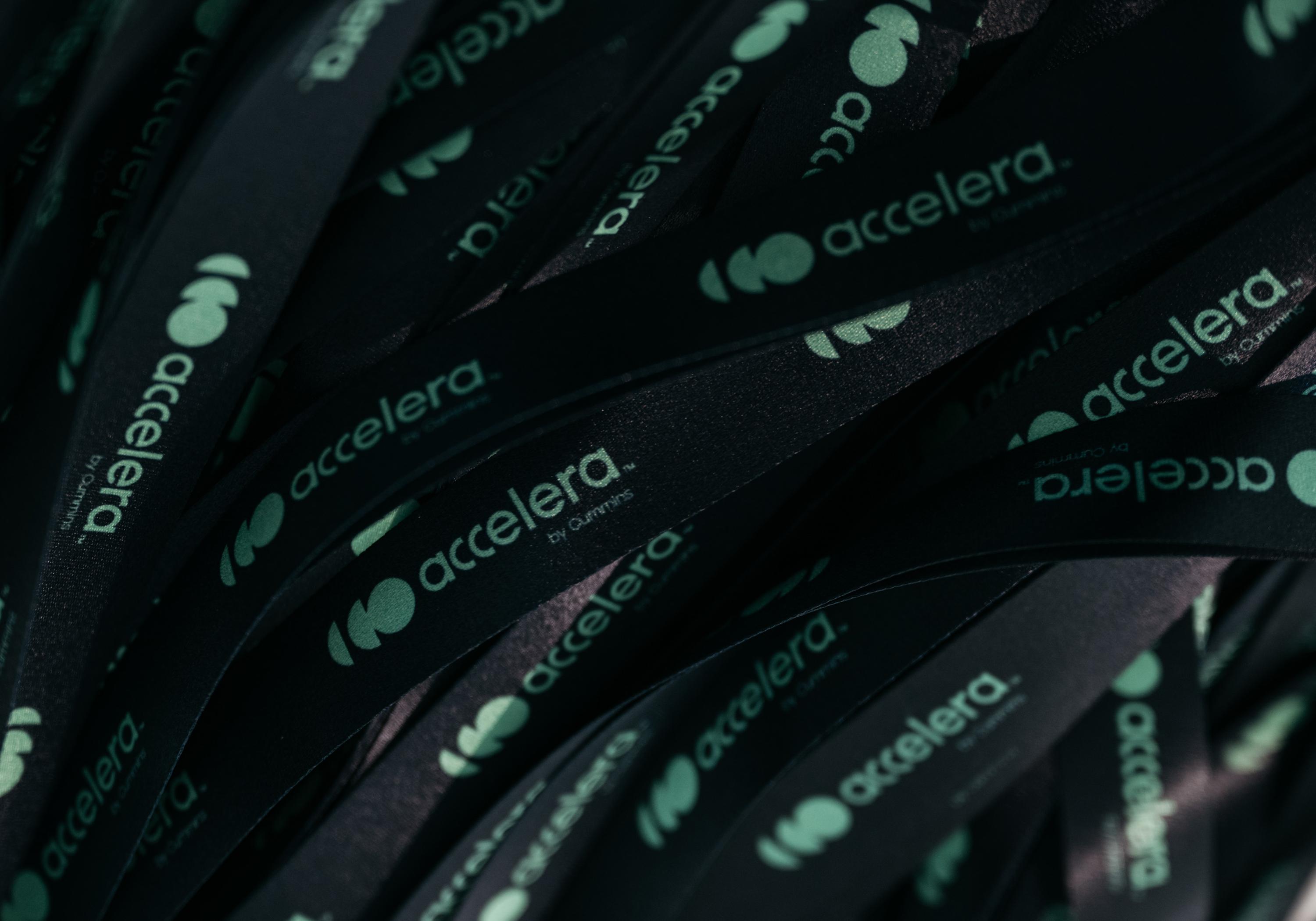 Black lanyards with green logo printed on them