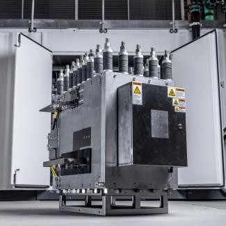 PEM electrolyzer unit in front of a system container